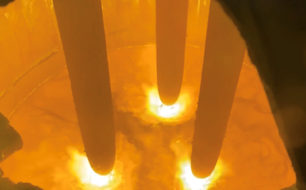 Hydrogen plasma between three hollow electrodes and a melt of red mud