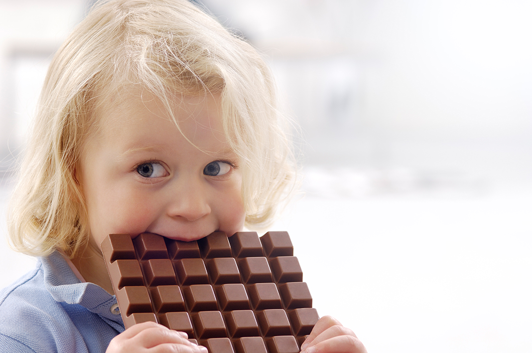 Child with a chocolate bar